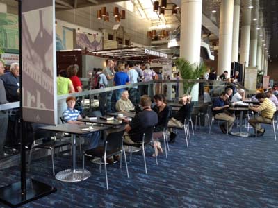 Messengers wait in line at Starbucks for hot coffee and caffeine.