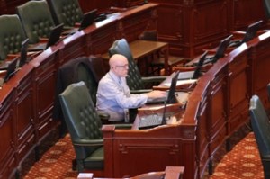 Rep. Greg Harris was the lone legislator on the floor before Friday's session began. Harris, who is gay and living with HIV, is the same-sex marriage bill's House sponsor.