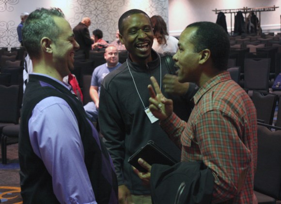 Outgoing Pastors' Conference president Chad Ozee (left) laughs with new president Michael Allen (right) and newly elected treasurer David Sutton.