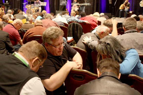 When Gary Frost led Summit attenders to intercede in small groups for children and youth, IBSA’s Pat Pajak (left) prayed with Ken and Kathy Schultz from Crosswinds Church in Plainfield, and a pastor from Iowa.