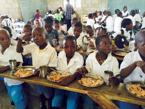 Mackenzie's mission team prepared lunch for kids at the school in Bigarade. 