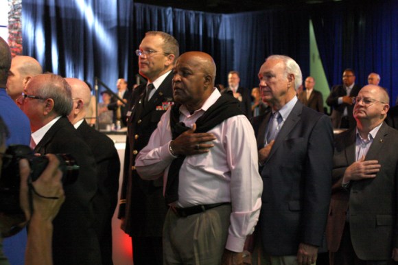 Robert Walker (third from right) leads the pledge of allegiance with other military veterans. Walker is missions pastor at Broadview Missionary Baptist Church in Chicago.
