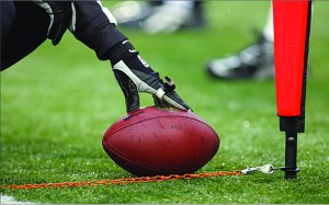 How is tithing like football?